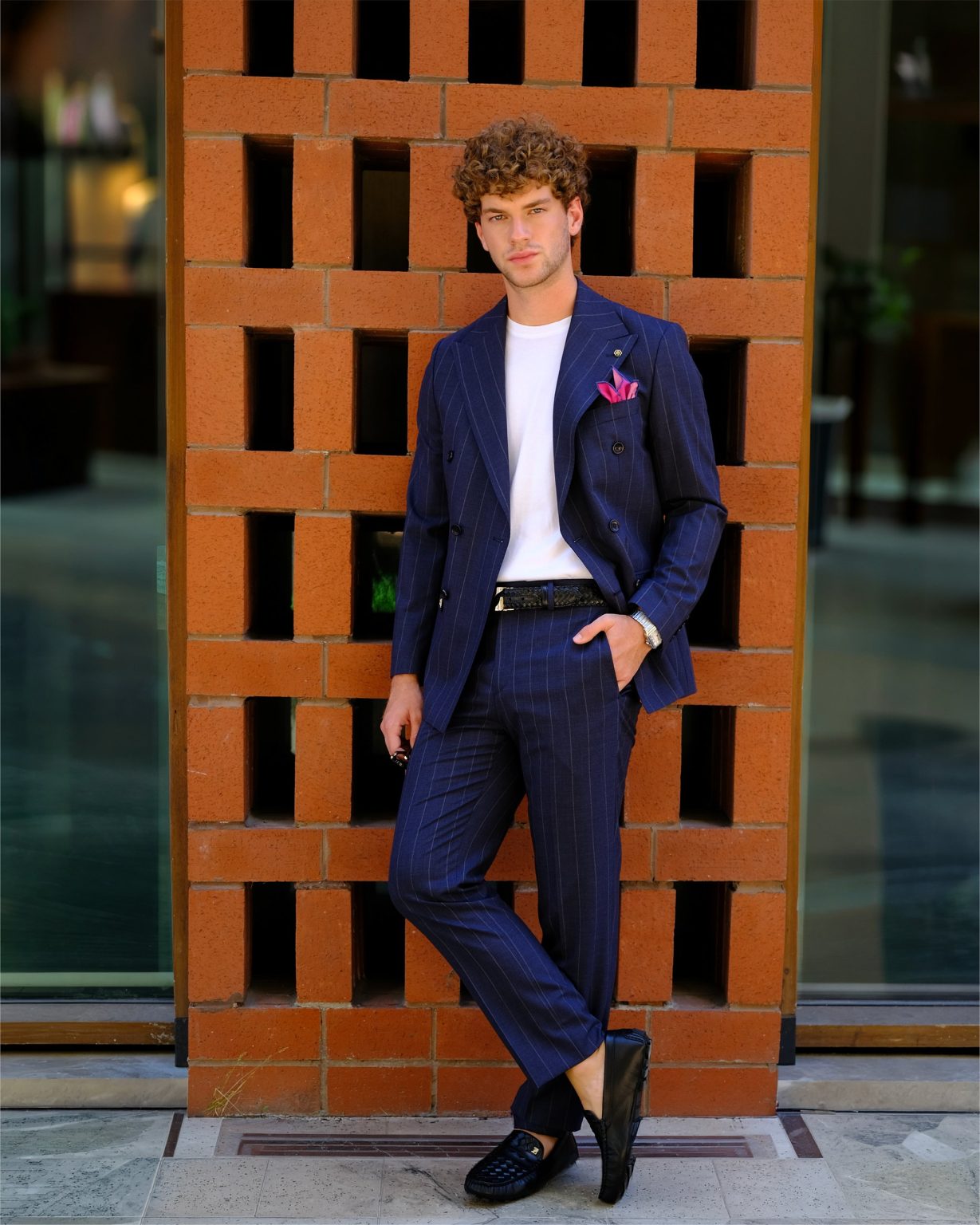 Pinstripe Suit – full look against brick
